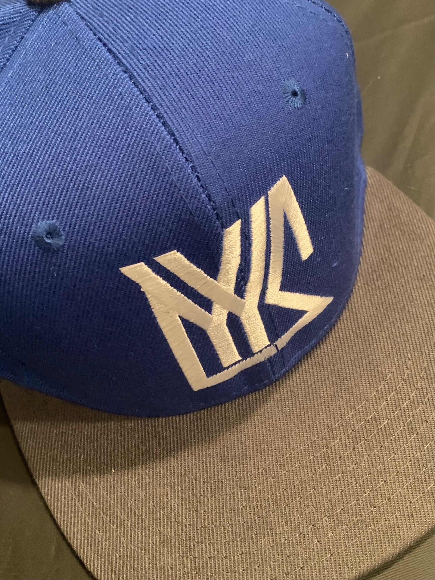 Dark Grey/Royal Blue Snap Back with white Logo
